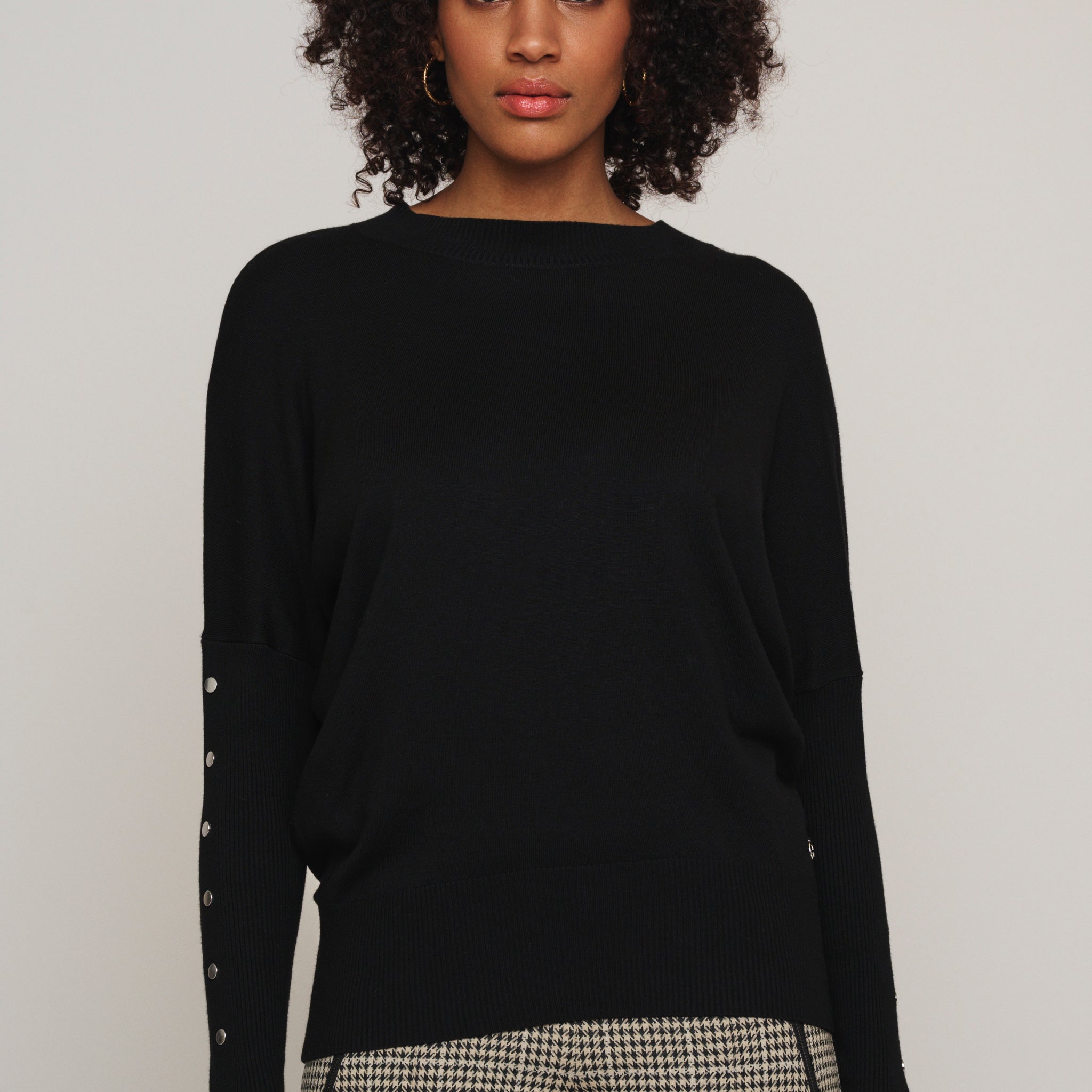 Hinke black boxy sweater with button detail